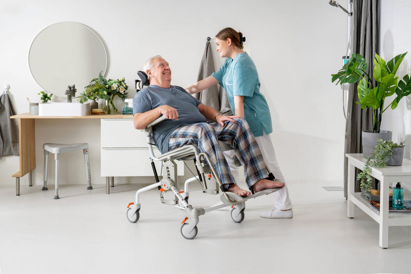 Etac Swift Mobil  Tilt 2  man in tilt mode
Provides Comfort and safety to both caregiver and user!
NextGenHME